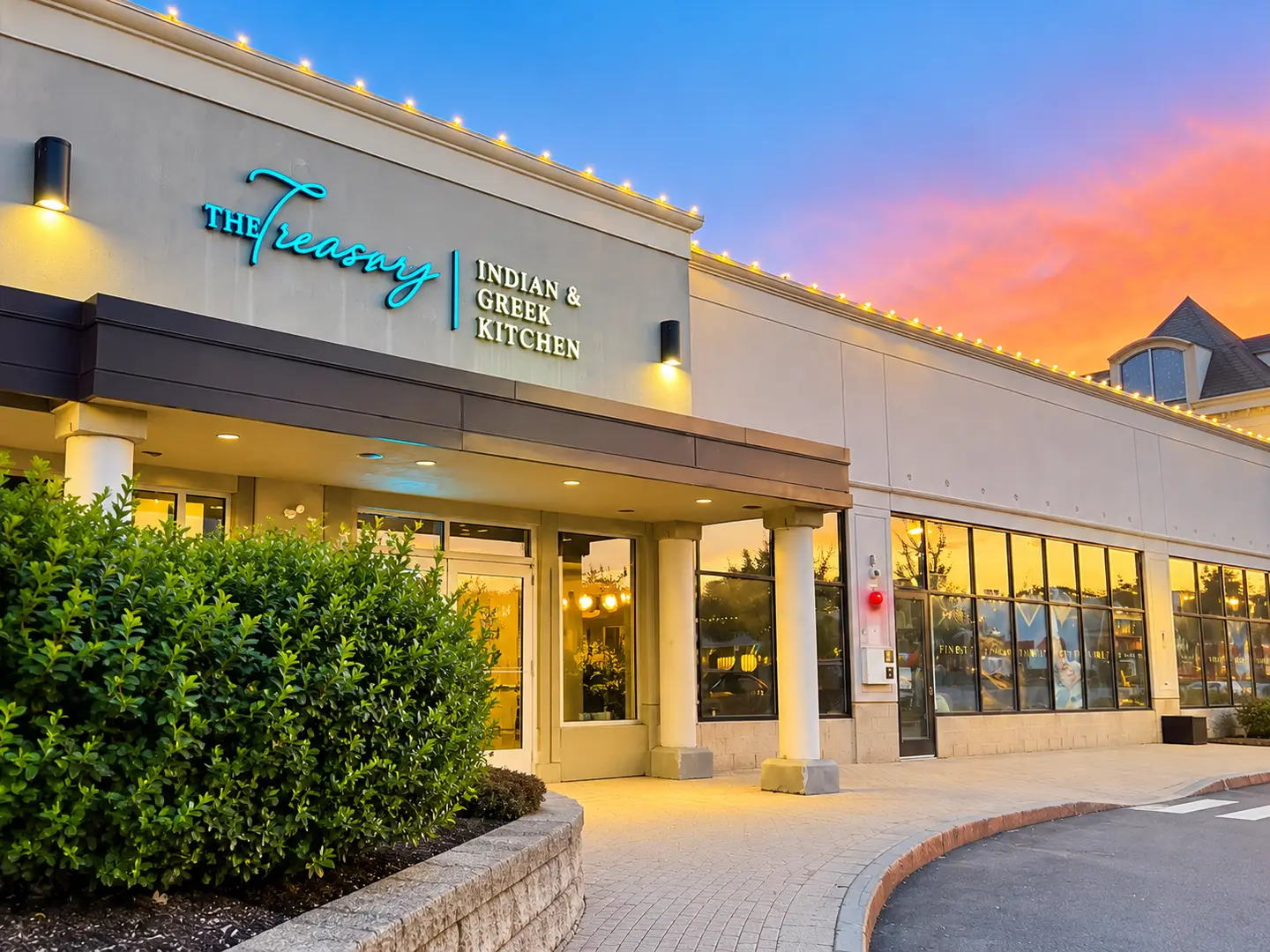 The Treasury, Indian & Greek Kitchen, on Wayside Road at sunset
