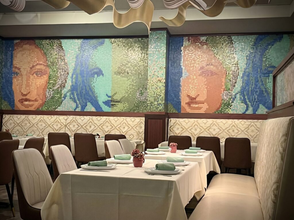 Family celebrating Father's Day dinner at an upscale Indian restaurant near Boston